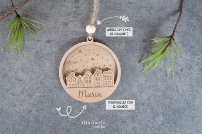 adorno con pueblo navideño